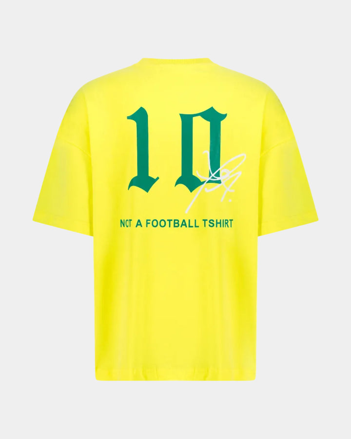 Brazil Yellow oversized t-shirt with green text and logo on a light grey background