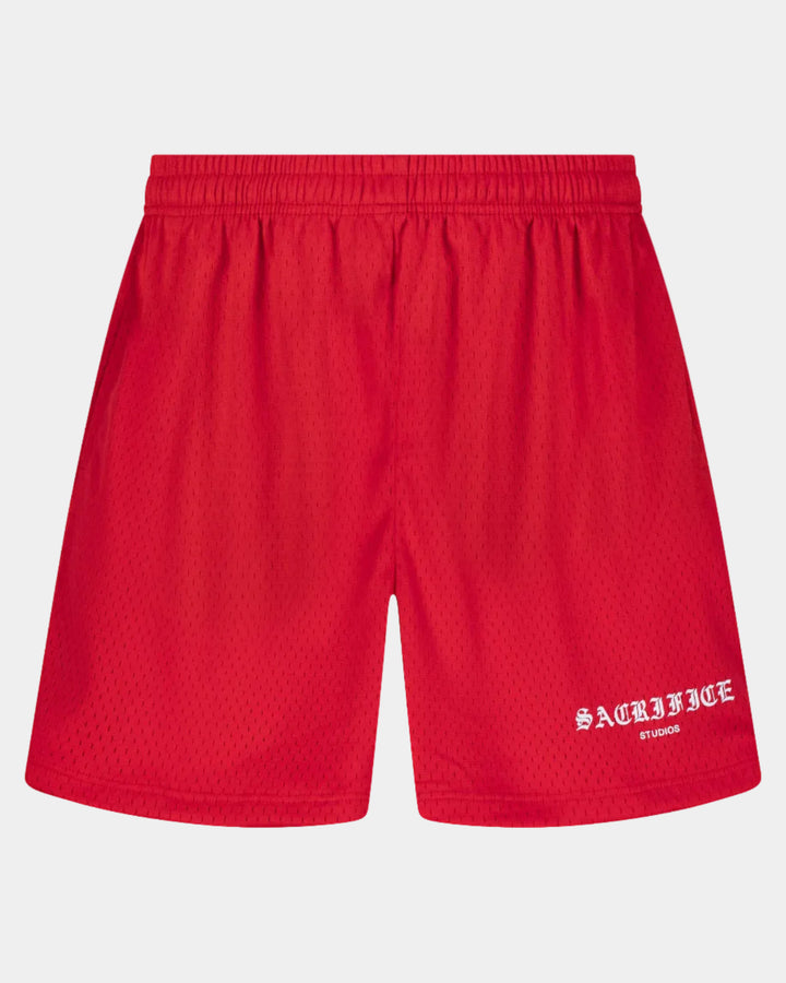 Red shorts with a brand logo on a white background
