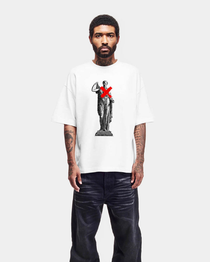 Person wearing a white t-shirt with a graphic design on a white background