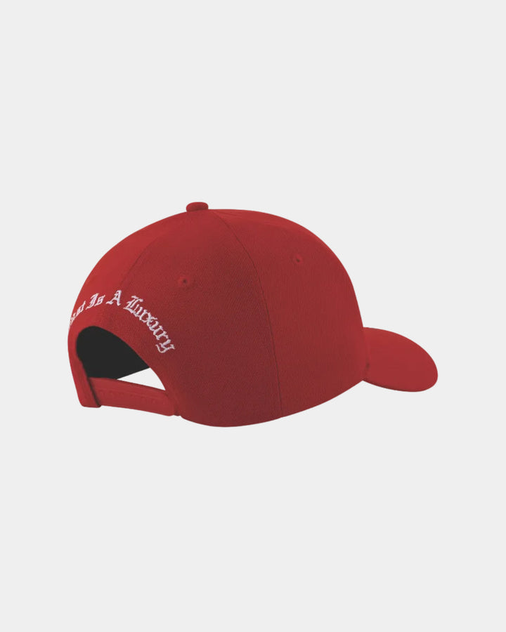 Red cap with white text on a grey background
