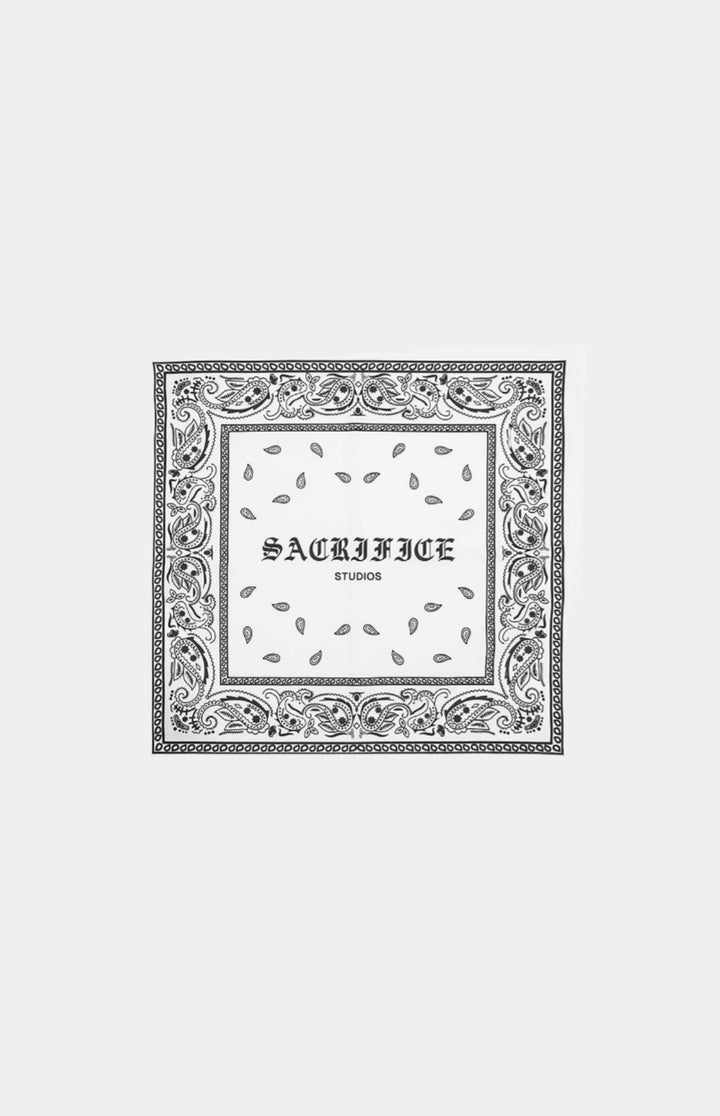 Premium bandana featuring a bold white graphic print. Expertly crafted in Portugal. Located in Dubai. 