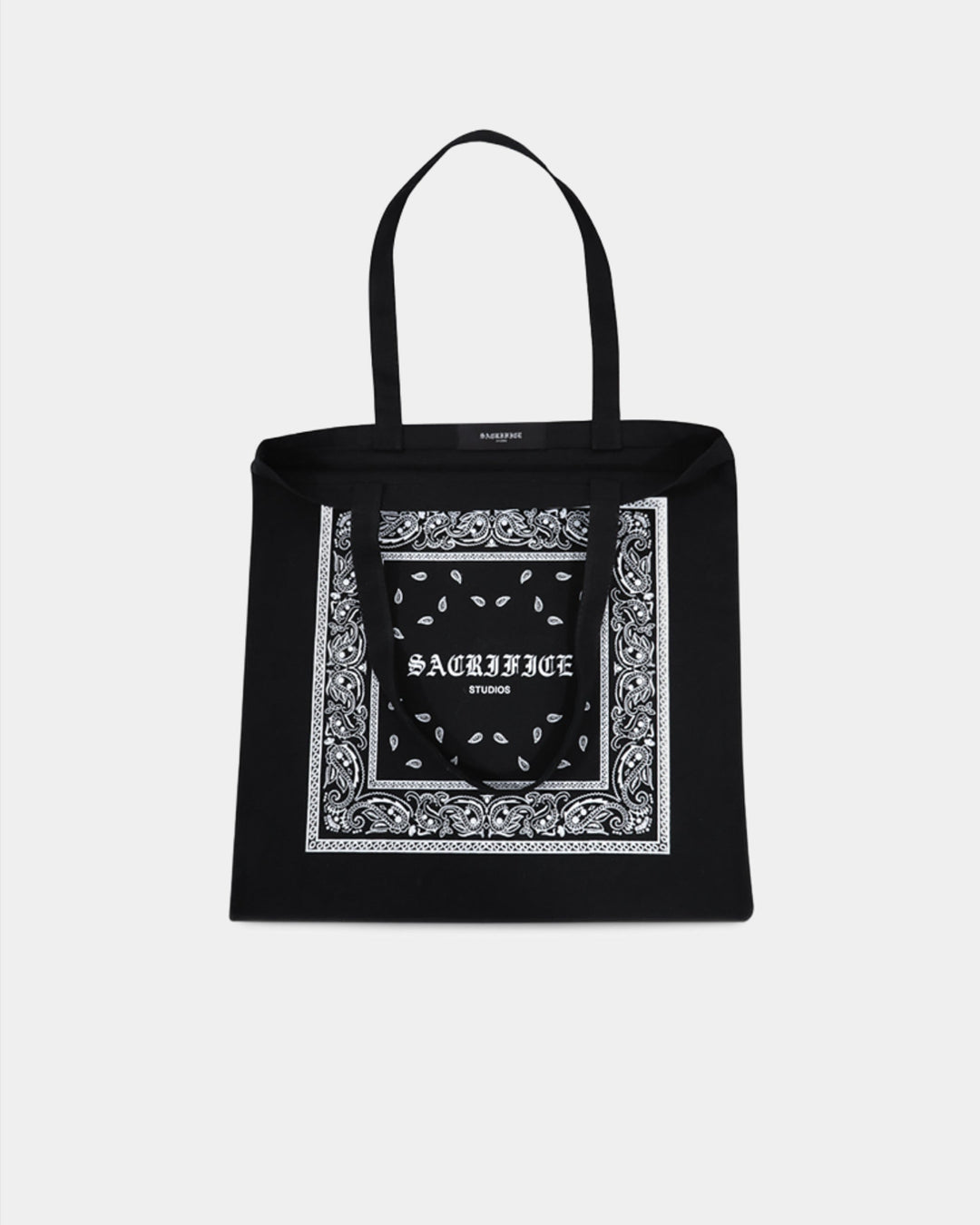 Premium bandana  tote bag featuring a bold white graphic print. Expertly crafted in Portugal. Located in Dubai. 